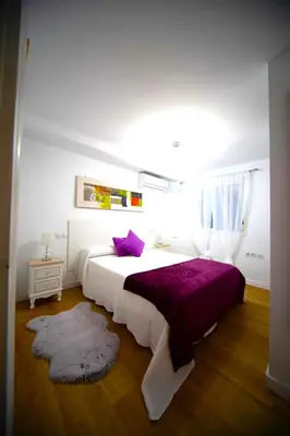 Cama o camas de una habitación en Santa Catalina Center Apartment