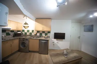 Una cocina o zona de cocina en Santa Catalina Center Apartment