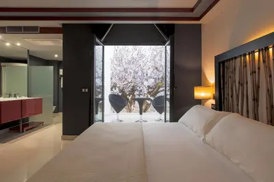 Cama o camas de una habitación en Hotel Infanta Leonor