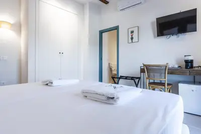 Cama o camas de una habitación en Hospedium Hotel Rural Virgen María