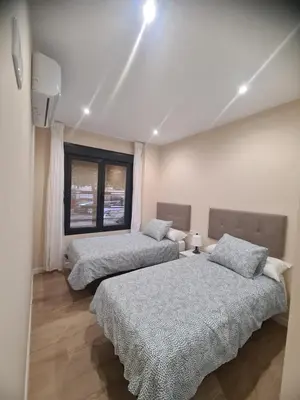 Cama o camas de una habitación en Mi Casa es Su Casa