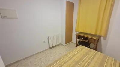 Cama o camas de una habitación en ALBERGUE LA TIÑOSA