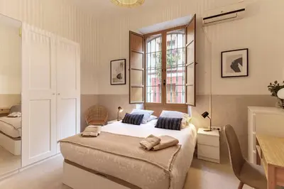 Cama o camas de una habitación en Modern spacious apartment central of Seville