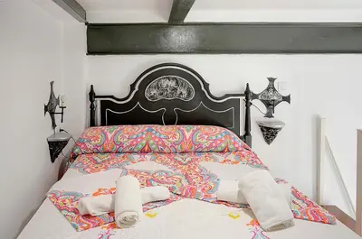 Cama o camas de una habitación en Magical Studio in the Center Feijoo