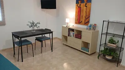 Una televisión o centro de entretenimiento en Apto I Santa Clara centro