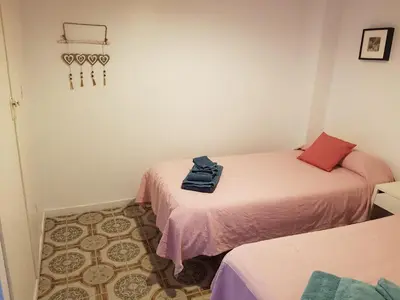 Cama o camas de una habitación en Apartamentos Marco Sancho Centro-Alameda-Setas