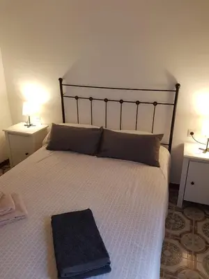 Cama o camas de una habitación en Apartamentos Marco Sancho Centro-Alameda-Setas