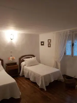 Cama o camas de una habitación en ALOJAMIENTO TURISTICO LAS SOLANERAS