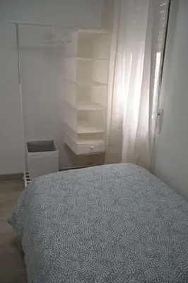 Cama o camas de una habitación en Cozy and well connected apartment