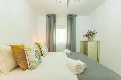 Cama o camas de una habitación en Cardenal Cervantes Deluxe by Valcambre