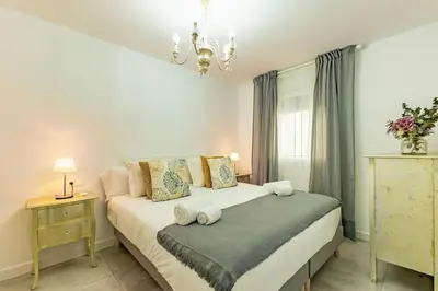 Cama o camas de una habitación en Cardenal Cervantes Deluxe by Valcambre