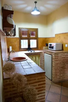 Una cocina o zona de cocina en Paraiso del Hueznar