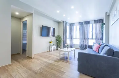Una televisión o centro de entretenimiento en Jardines Valle 3 rooms 2 baños