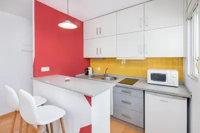 Una cocina o zona de cocina en BHost - Plaza de la Paja