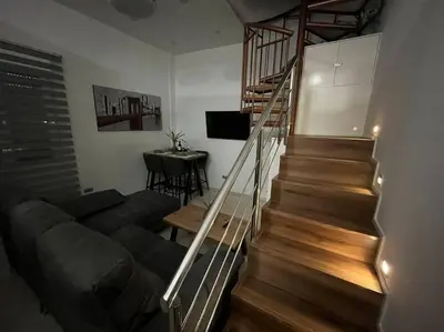 Una televisión o centro de entretenimiento en Apartamento Tinte Centro Córdoba