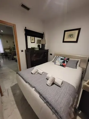 Cama o camas de una habitación en Apartamento con encanto muy céntrico en Pilatos Sevilla ideal para pareja