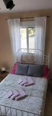 Cama o camas de una habitación en Bed & Breakfast Casa Ceratonia