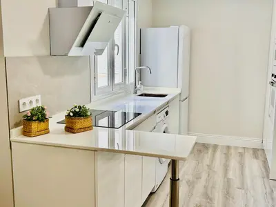 Una cocina o zona de cocina en Gran Capitán Home