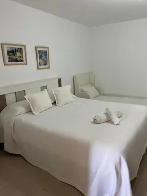 Cama o camas de una habitación en Villa Carmen