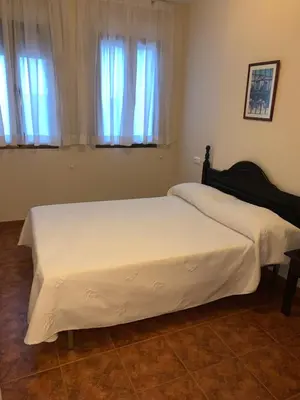 Cama o camas de una habitación en La Cueva