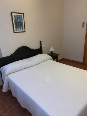 Cama o camas de una habitación en La Cueva