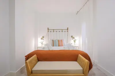 Cama o camas de una habitación en Santiago Suite Home