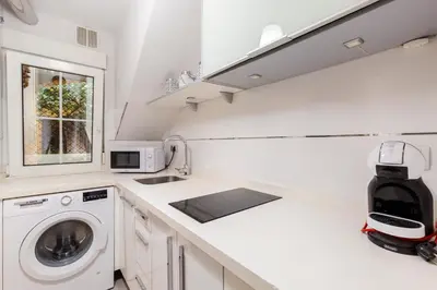 Una cocina o zona de cocina en Santiago Suite Home