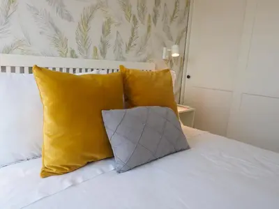 Cama o camas de una habitación en Tinte Boutique Suite