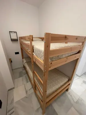Cama o camas de una habitación en WISH SUITE PONCE DE LEON