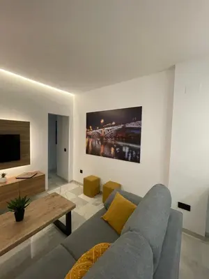 Una televisión o centro de entretenimiento en WISH SUITE PONCE DE LEON