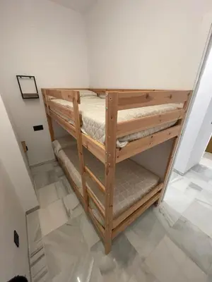 Cama o camas de una habitación en WISH SUITE PONCE DE LEON
