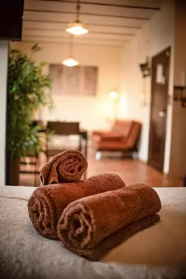 Cama o camas de una habitación en Rincón ÁRABE junto al TEMPLO ROMANO y AYUNTAMIENTO