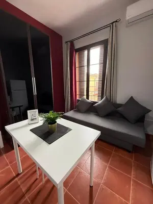 Zona de estar de Estudio familiar con baño compartido SEVILLA DELUXE LOS ROSALES