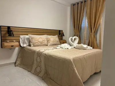 Cama o camas de una habitación en SWEET HOME ALEGRIA-MASCOTAs