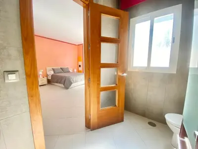 Cama o camas de una habitación en La Casa de Enfrente