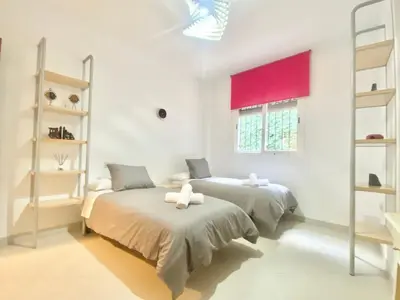 Cama o camas de una habitación en La Casa de Enfrente