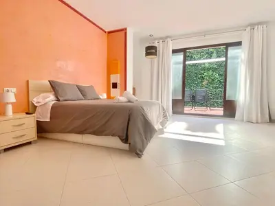 Cama o camas de una habitación en La Casa de Enfrente