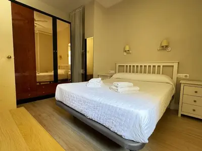 Cama o camas de una habitación en Apartamento en San Bernardo, el barrio torero