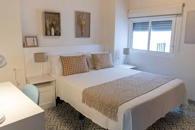 Cama o camas de una habitación en Apartamentos San Francisco
