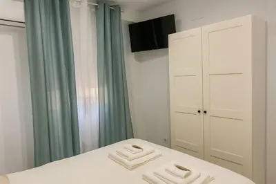 Cama o camas de una habitación en Alojamiento Baeza California 4B