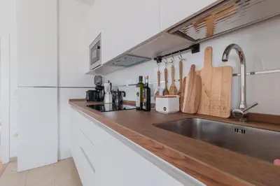 Una cocina o zona de cocina en Apto. El Ático de los Patios