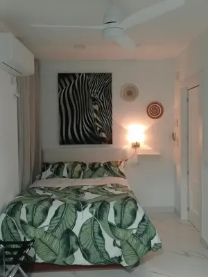 Cama o camas de una habitación en Moneiba Centro