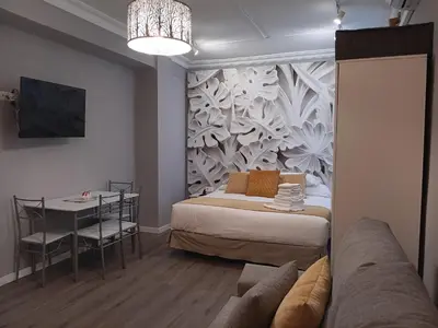 Cama o camas de una habitación en Serendipity Hispalis Nervión