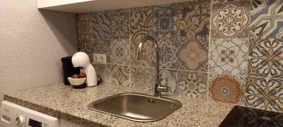 Una cocina o zona de cocina en Serendipity Hispalis Nervión