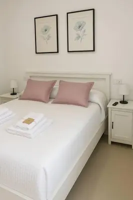 Cama o camas de una habitación en Alojamiento Baeza California 4A