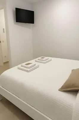 Cama o camas de una habitación en Alojamiento Baeza California 4A