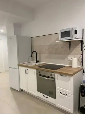 Una cocina o zona de cocina en Alojamiento Baeza California 4A