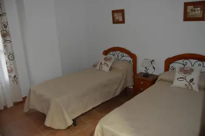 Cama o camas de una habitación en Casa Tita Carmen
