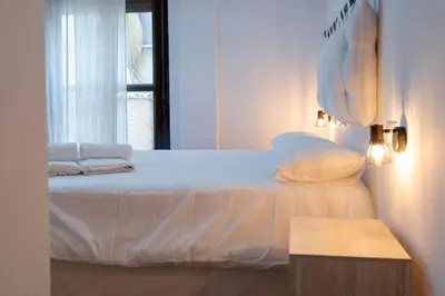 Cama o camas de una habitación en A orillas del Guadalquivir