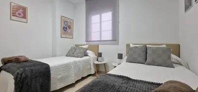 Cama o camas de una habitación en DS LealHomes, patio and terrace